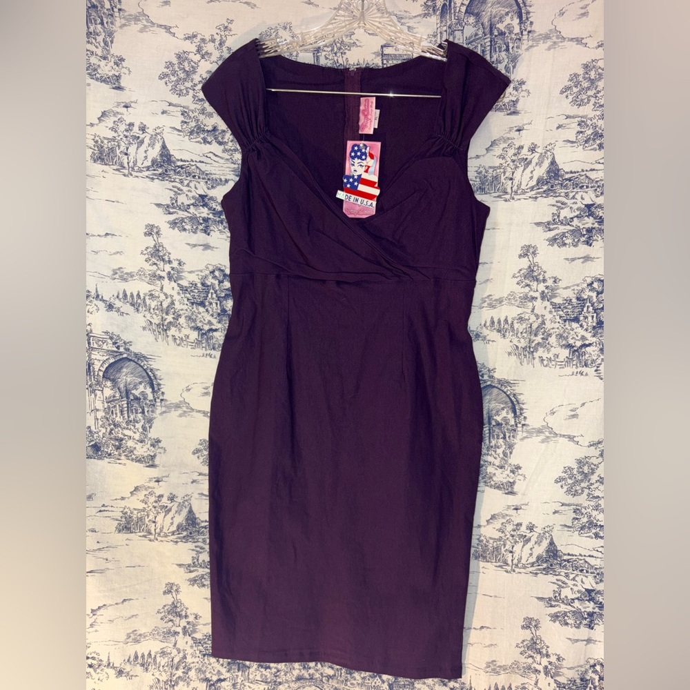 Fitted purple Pinup couture dress new with tags. Size XL